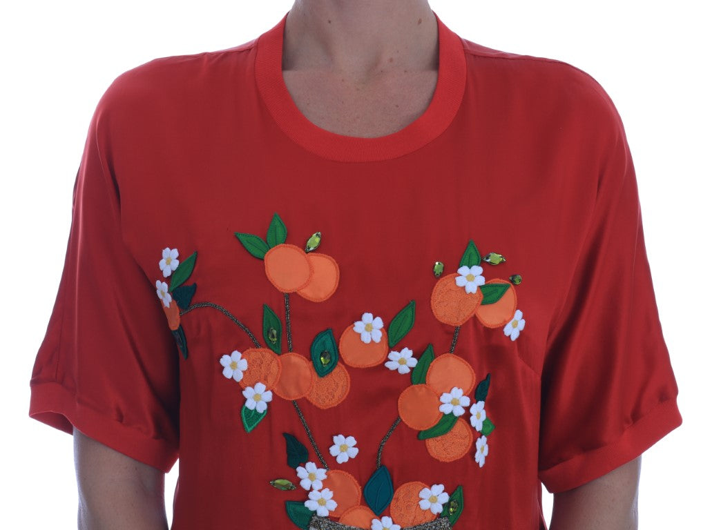 Elegante blusa de seda roja adornada con cristales