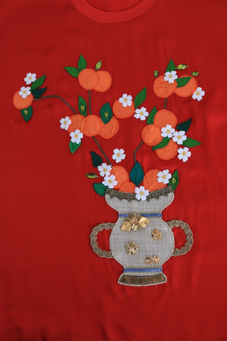Elegante blusa de seda roja adornada con cristales