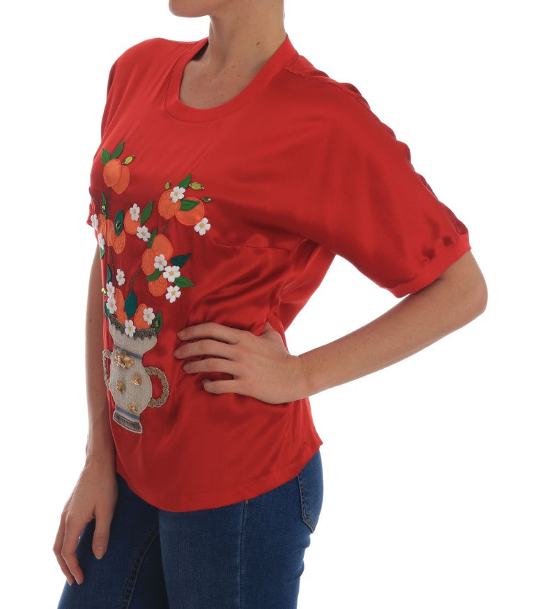 Elegante blusa de seda roja adornada con cristales