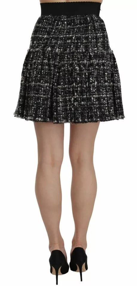 Minifalda de lana con volantes y cuadros negros