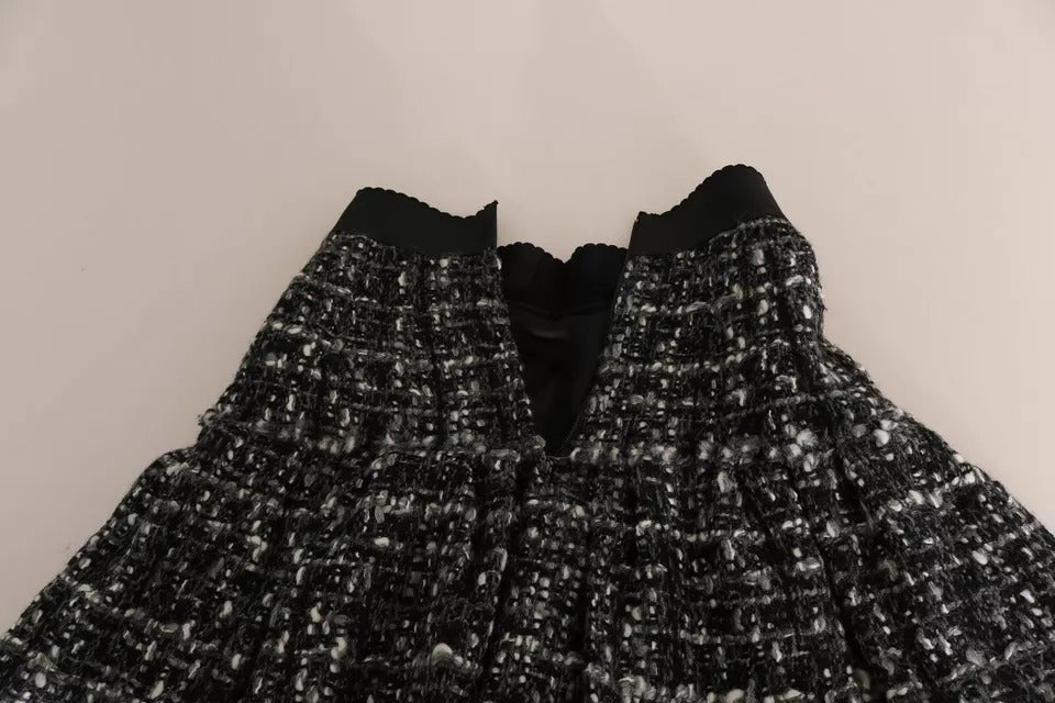 Minifalda de lana con volantes y cuadros negros