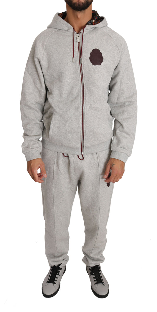 Conjunto elegante de chándal gris con capucha