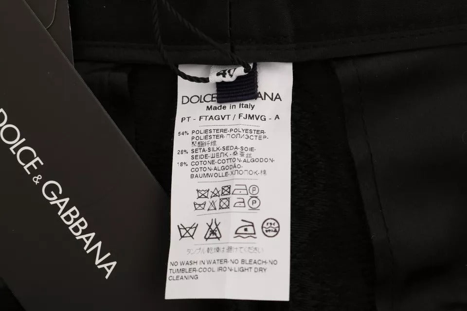 Pantalones de cintura alta con brocado floral negro
