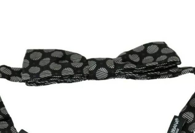 Corbata de seda negra con círculos para hombre