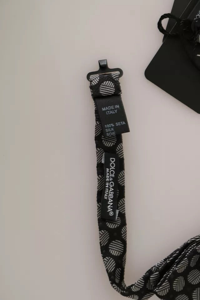 Corbata de seda negra con círculos para hombre