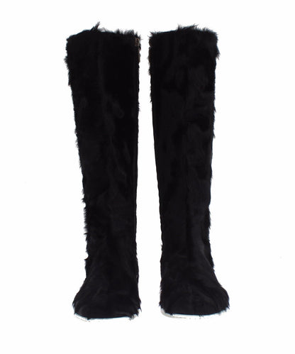 Botas planas elegantes de piel de color negro