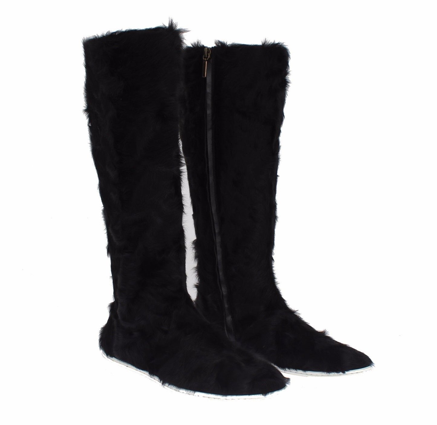 Botas planas elegantes de piel de color negro