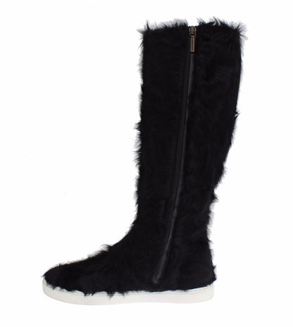 Botas planas elegantes de piel de color negro