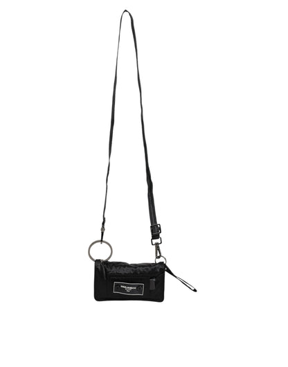 Bolso bandolera de tela negra con logo y dos compartimentos