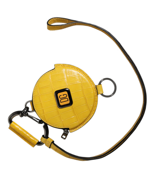 Monedero redondo de cuero amarillo con logotipo de DG y cordón