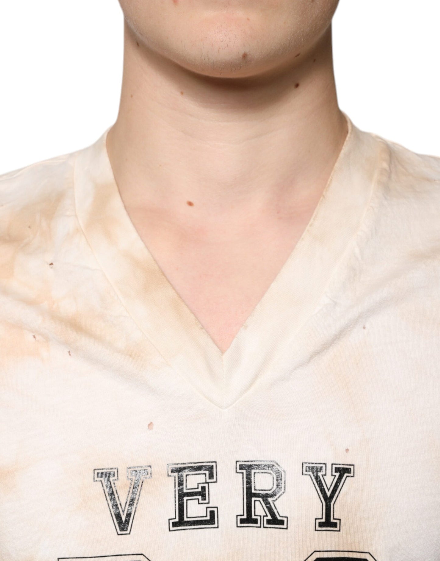 Camiseta de algodón con cuello en V y estampado gráfico beige