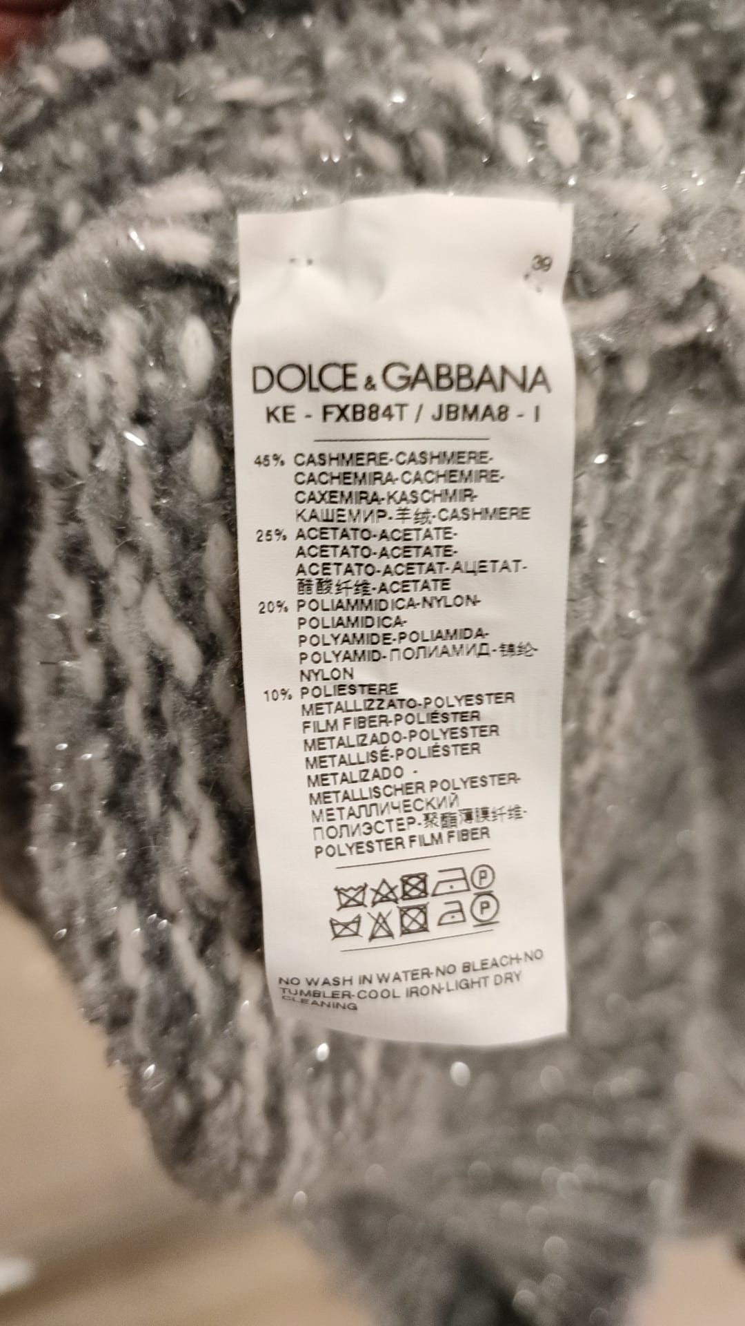 Elegante jersey de cuello alto en mezcla de cachemira gris