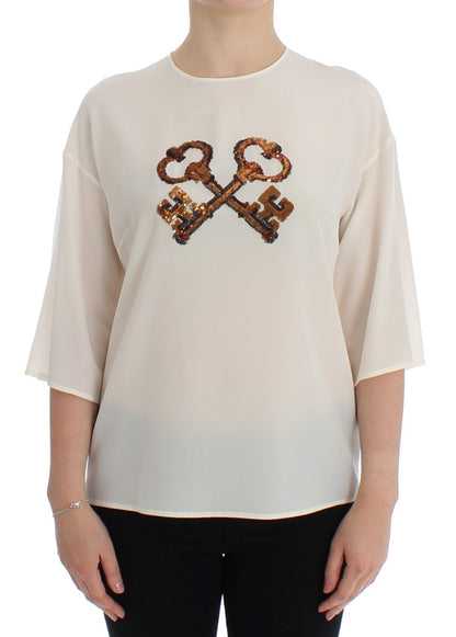 Blusa de seda con lentejuelas color marfil