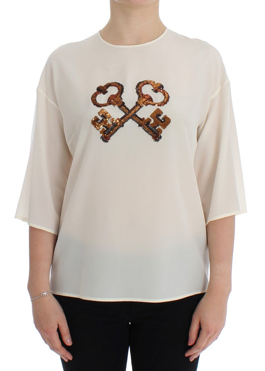 Blusa de seda con lentejuelas color marfil