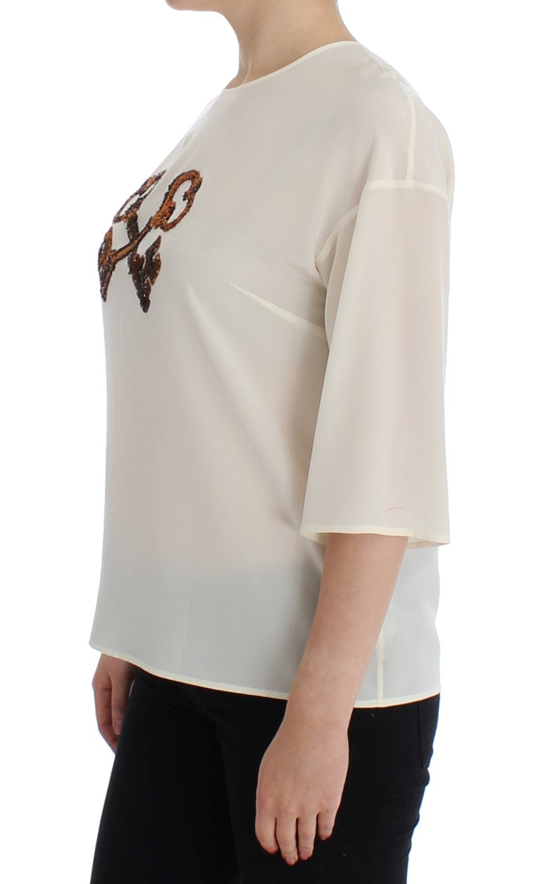 Blusa de seda con lentejuelas color marfil