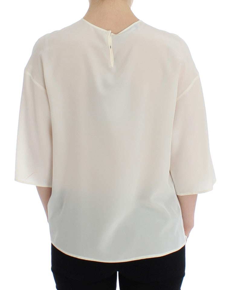 Blusa de seda con lentejuelas color marfil