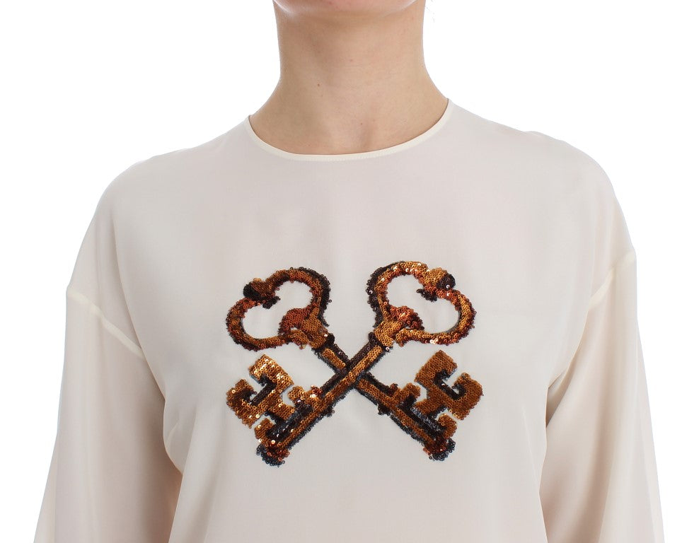Blusa de seda con lentejuelas color marfil