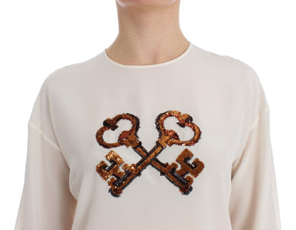 Blusa de seda con lentejuelas color marfil