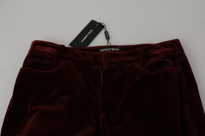 Pantalones ajustados elásticos de terciopelo burdeos