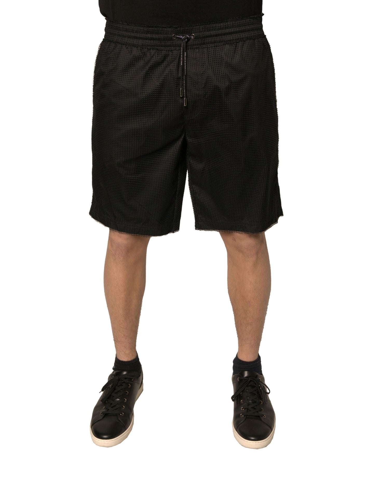 Pantalones cortos de cintura media de jersey de poliéster negro