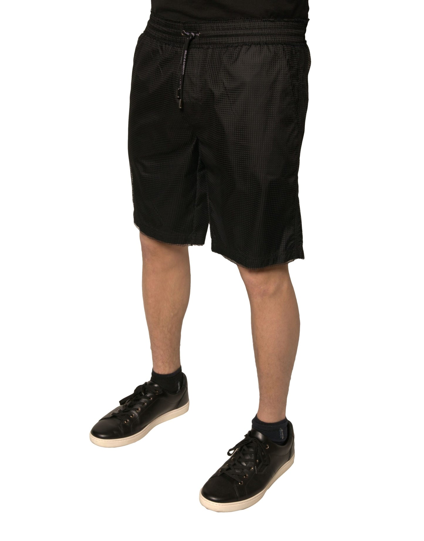 Pantalones cortos de cintura media de jersey de poliéster negro