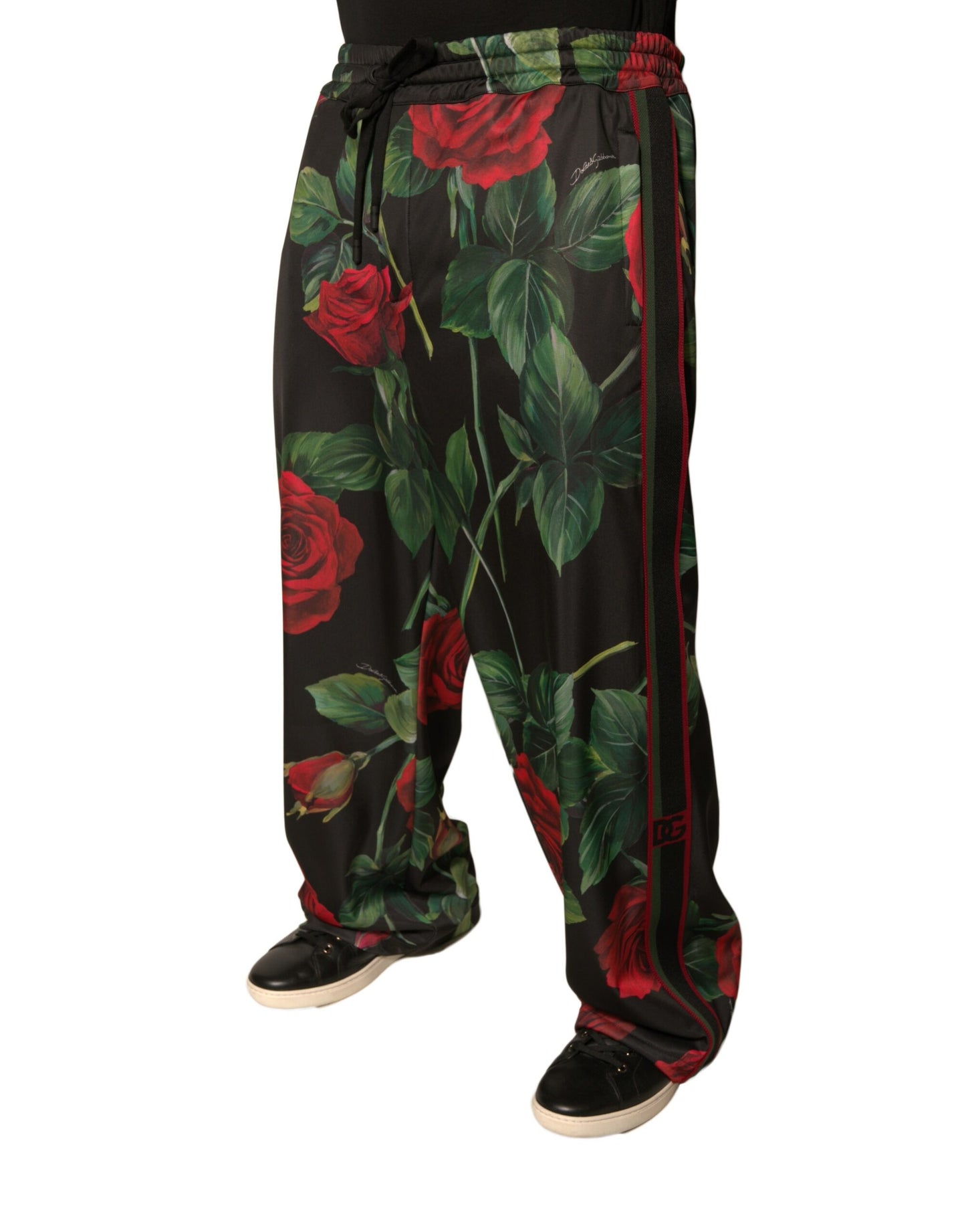 Pantalones deportivos negros de poliéster con estampado floral