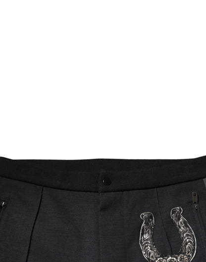 Pantalones ajustados de lana con herraduras negras