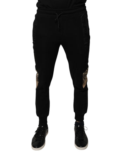 Pantalones deportivos ajustados de leopardo negro