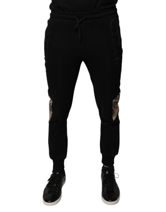 Pantalones deportivos ajustados de leopardo negro