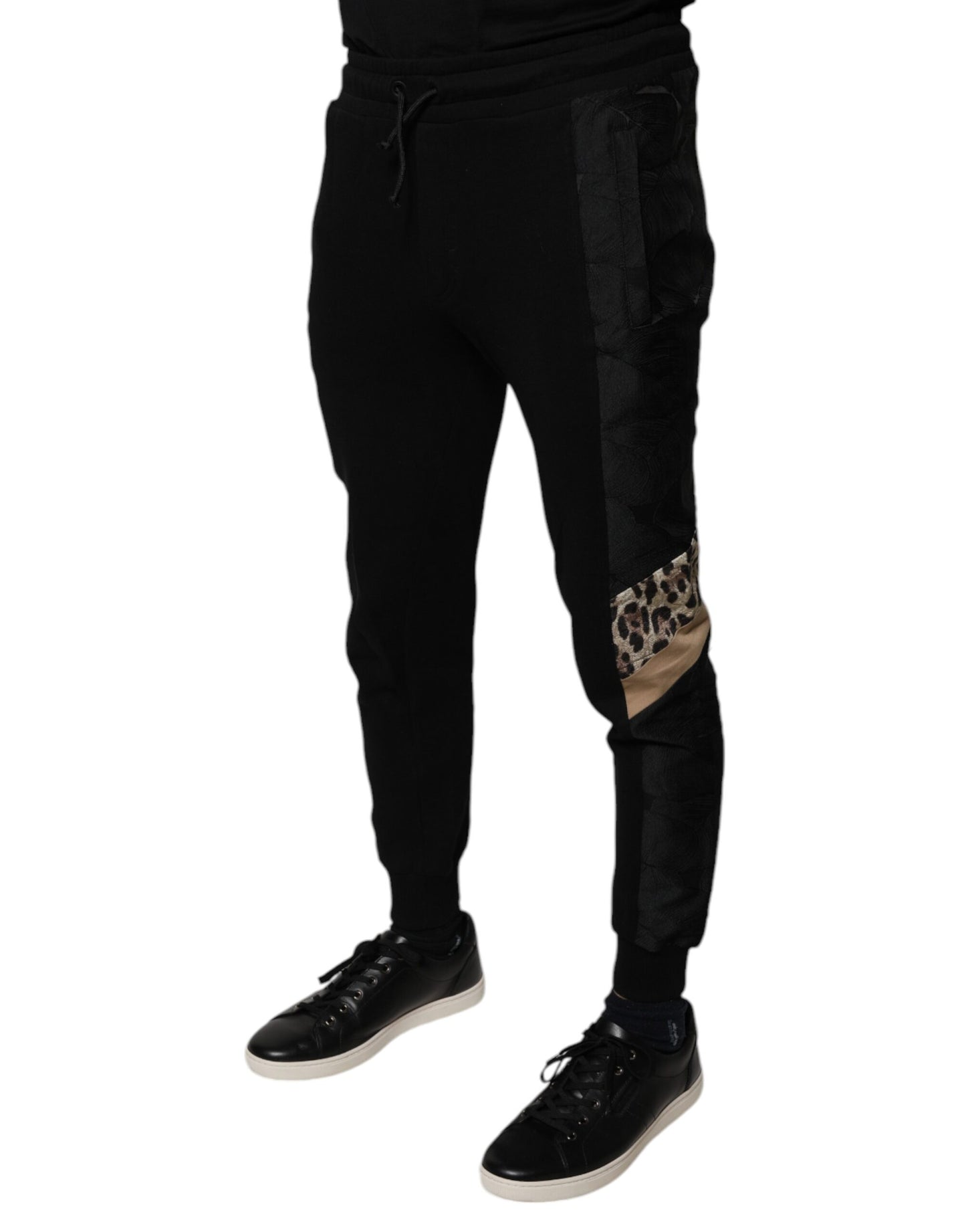 Pantalones deportivos ajustados de leopardo negro
