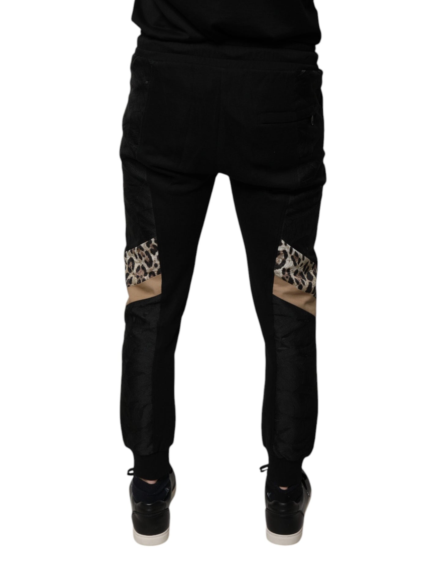 Pantalones deportivos ajustados de leopardo negro