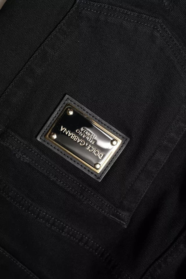 Vaqueros ajustados de algodón negro con logo y rotos