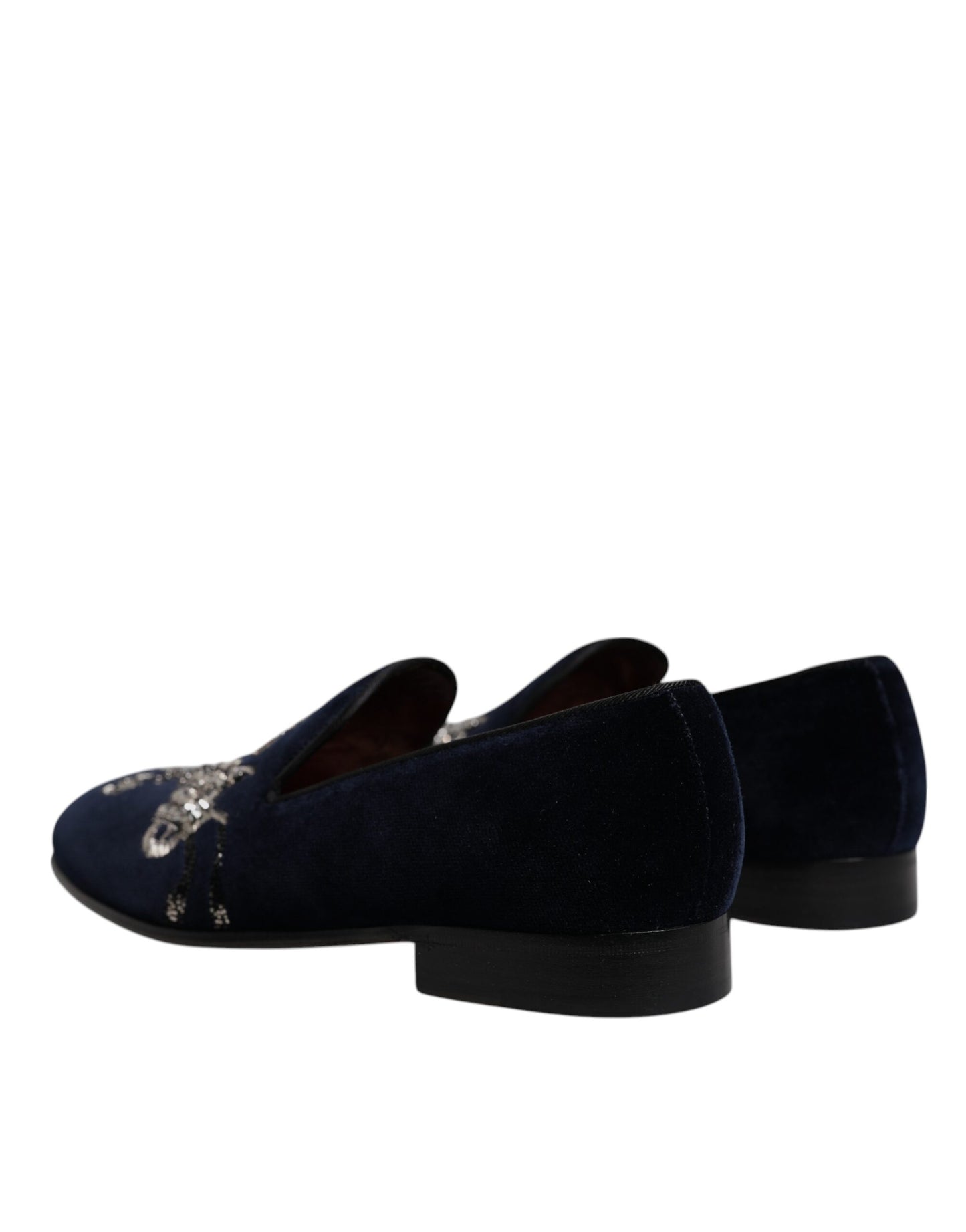 Mocasines de terciopelo negro con diseño floral y diseño de pistola