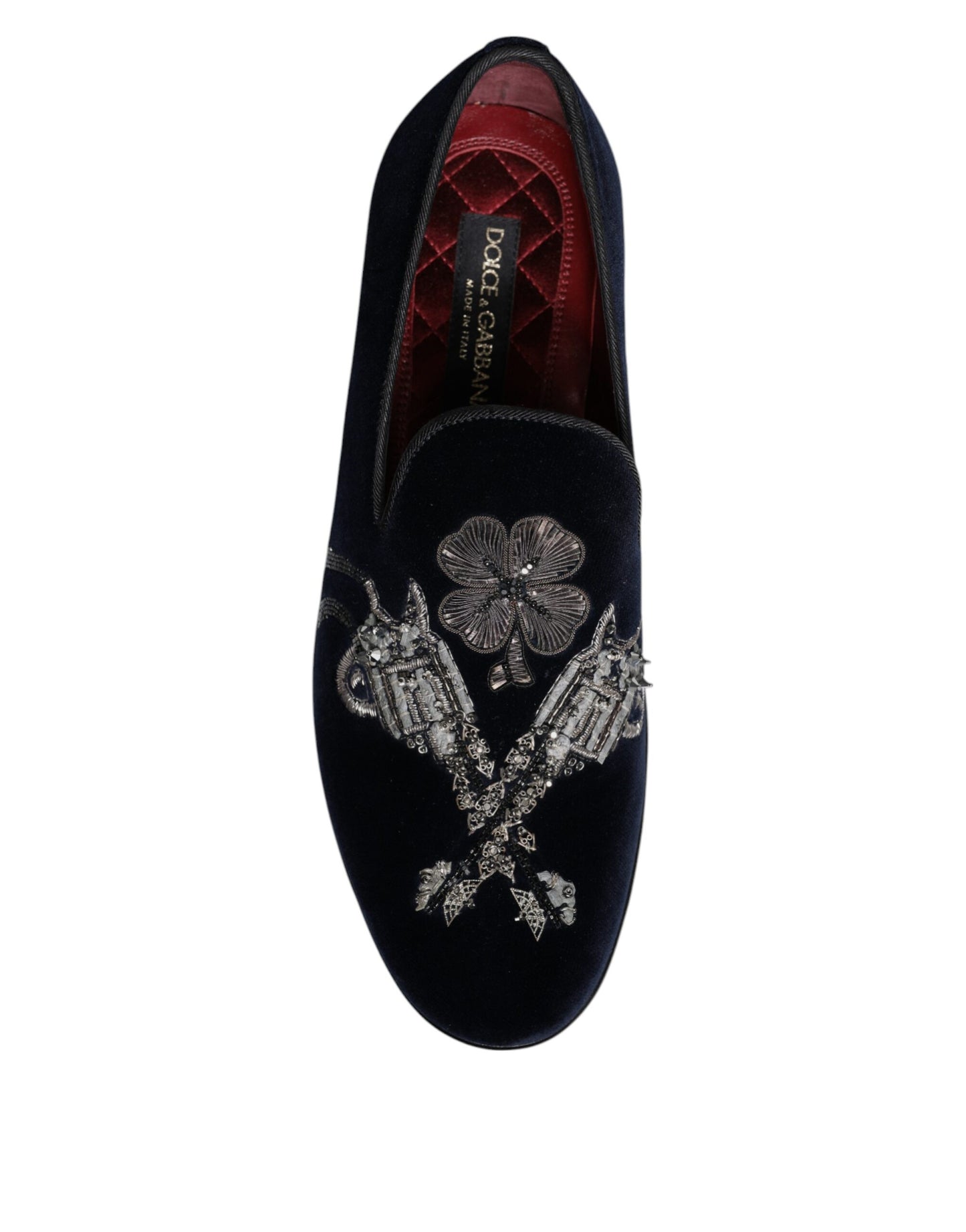 Mocasines de terciopelo negro con diseño floral y diseño de pistola