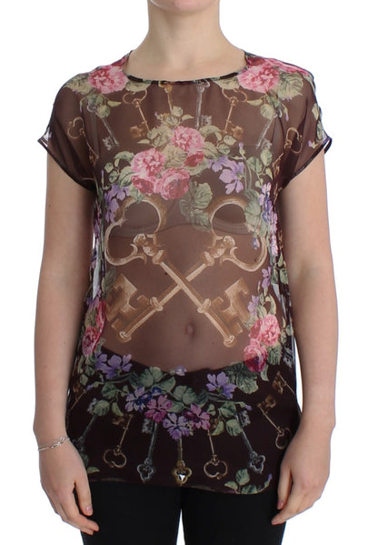 Elegante blusa de seda floral con mangas cortas