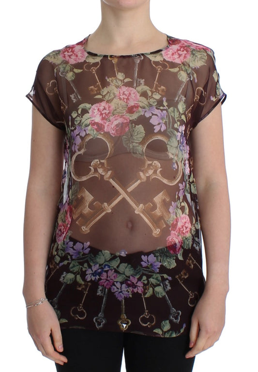 Elegante blusa de seda floral con mangas cortas