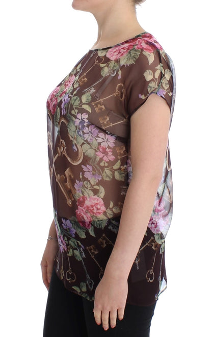 Elegante blusa de seda floral con mangas cortas