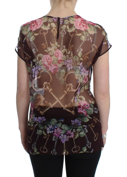 Elegante blusa de seda floral con mangas cortas