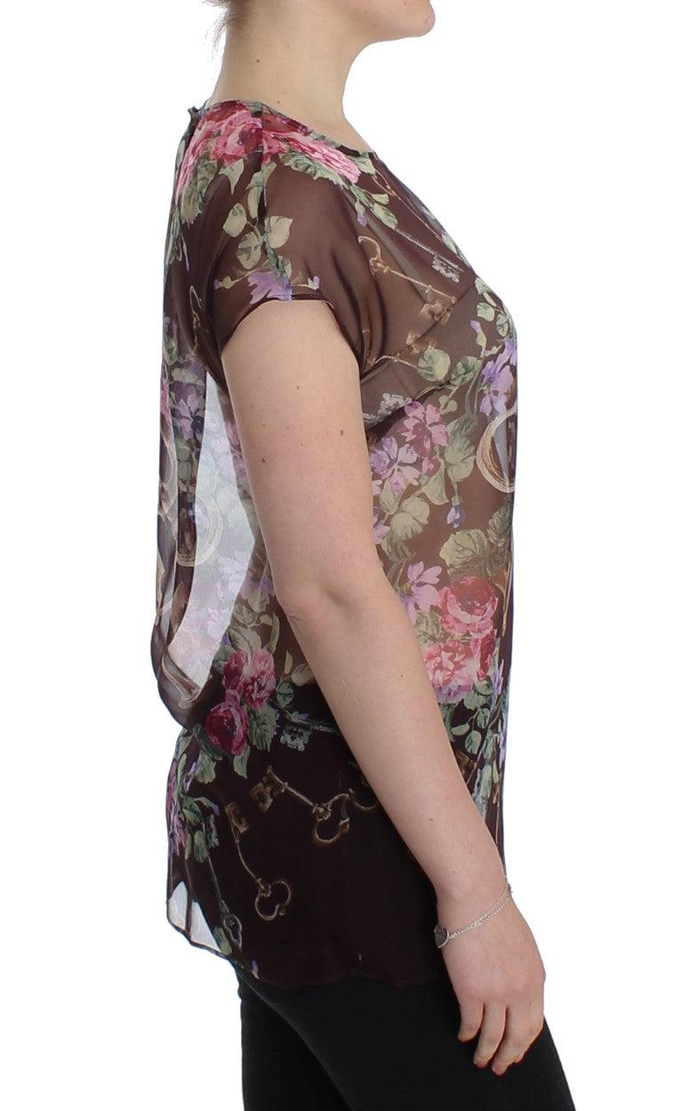 Elegante blusa de seda floral con mangas cortas