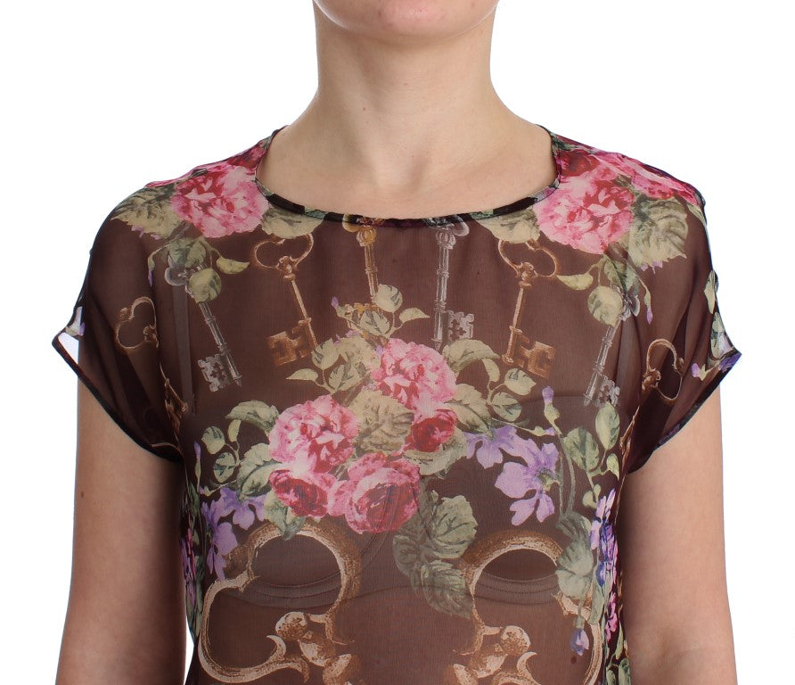 Elegante blusa de seda floral con mangas cortas
