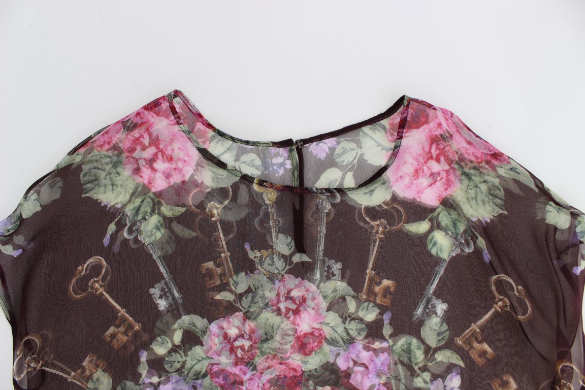 Elegante blusa de seda floral con mangas cortas