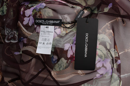 Elegante blusa de seda floral con mangas cortas