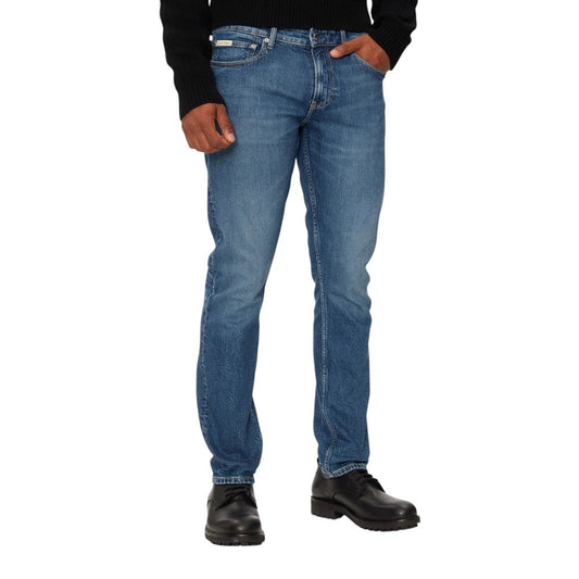Vaqueros y pantalones de algodón azul