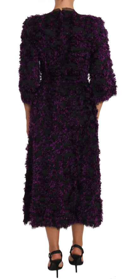 Elegante vestido con flecos en morado y negro