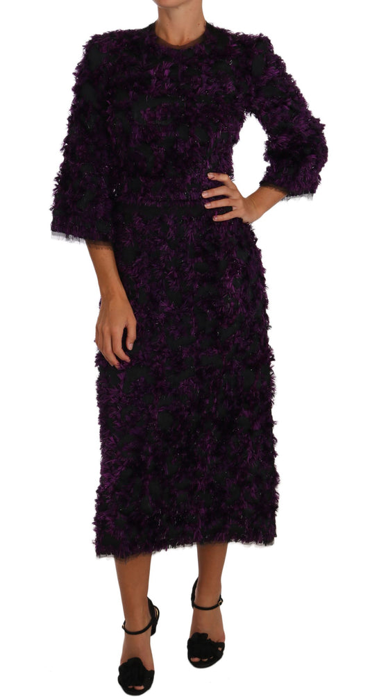 Elegante vestido con flecos en morado y negro