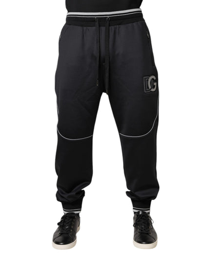 Pantalones deportivos negros con logotipo de poliéster