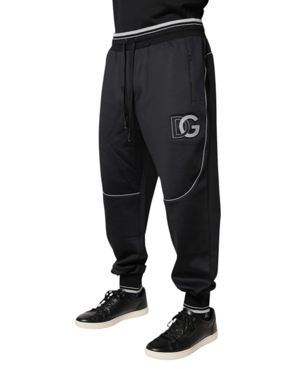 Pantalones deportivos negros con logotipo de poliéster