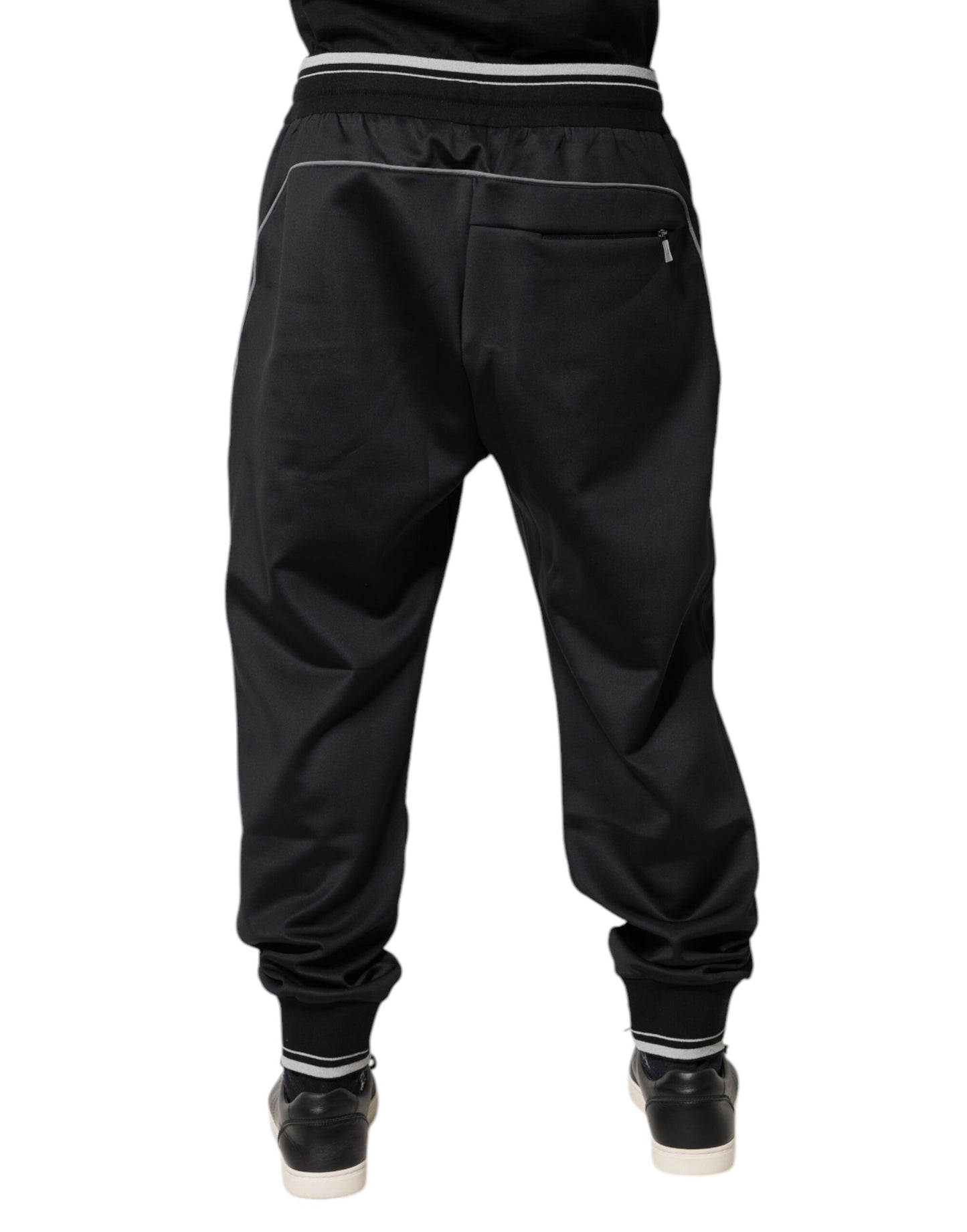 Pantalones deportivos negros con logotipo de poliéster