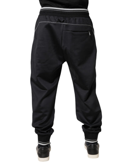 Pantalones deportivos negros con logotipo de poliéster
