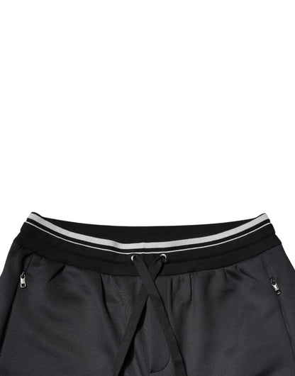 Pantalones deportivos negros con logotipo de poliéster